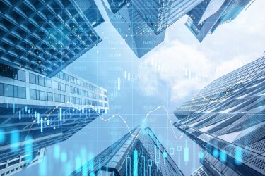 Creative glowing big data forex candlestick chart on blurry city background. Trade, technology, investment and analysis concept. Double exposure